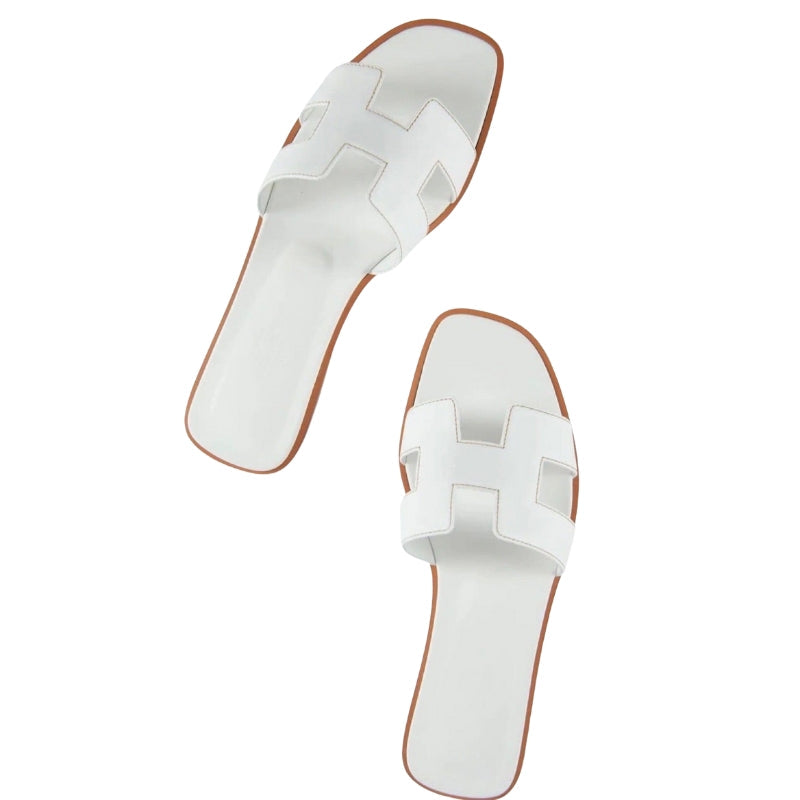 Clara – Flade Slip-On Sandaler med Udskæringsdetaljer