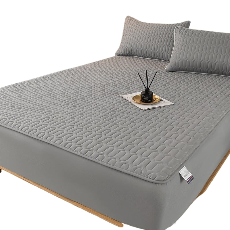 AquaSlumber – Vandtæt Madrasbeskytter med Quiltet Polstring og Elastisk Pasform