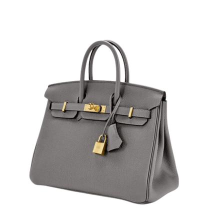 Marcellin – Struktureret håndtaske med elegant låsedetaljer og rummeligt interiør til daglig brug