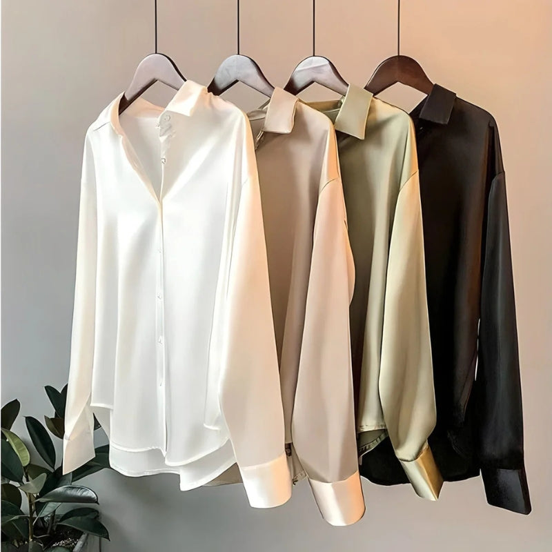 Ava – Elegant langærmet bluse med knaplukning foran