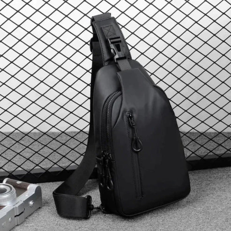 CarryEase – Vandtæt Crossbody-Taske med USB-Port og Flere Rum