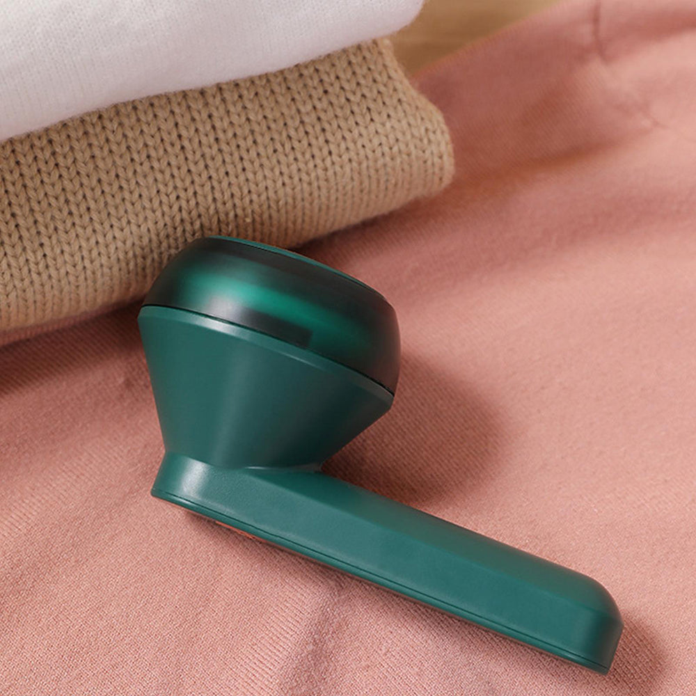 GleamGlide – Håndholdt barbermaskine til tekstiler med skarp kant og ergonomisk design