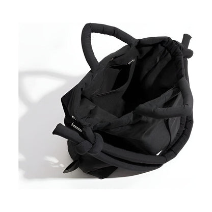 Knottia – Stilfuld håndtaske med unikt knyttet håndtag og justerbar rem