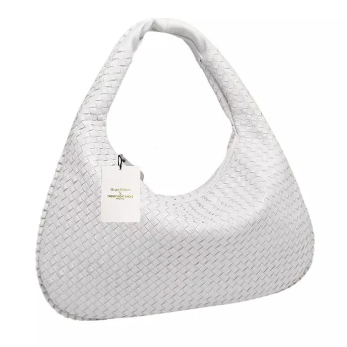 Talira – Chic mulepose med tophåndtag med ikonisk lås og strømlinet interiør