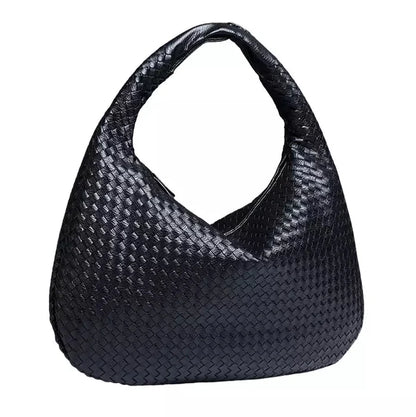 Talira – Chic mulepose med tophåndtag med ikonisk lås og strømlinet interiør